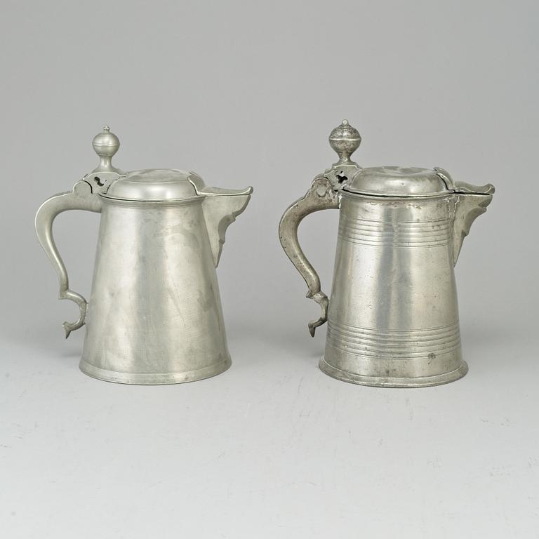 Two pewter tankards, one by Carl Petter Eckerström, Västerås 1833.