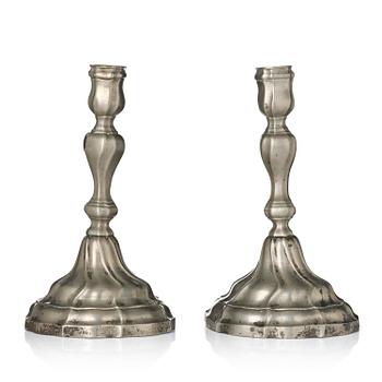 160. A pair of rococo pewter candlsticks by H. G. Pschorn, Stockholm 1769.