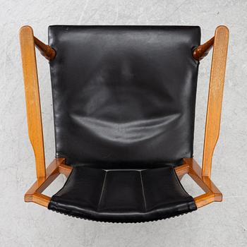 Josef Frank, two armchairs, model B 2067, Svenskt Tenn pre 1985.