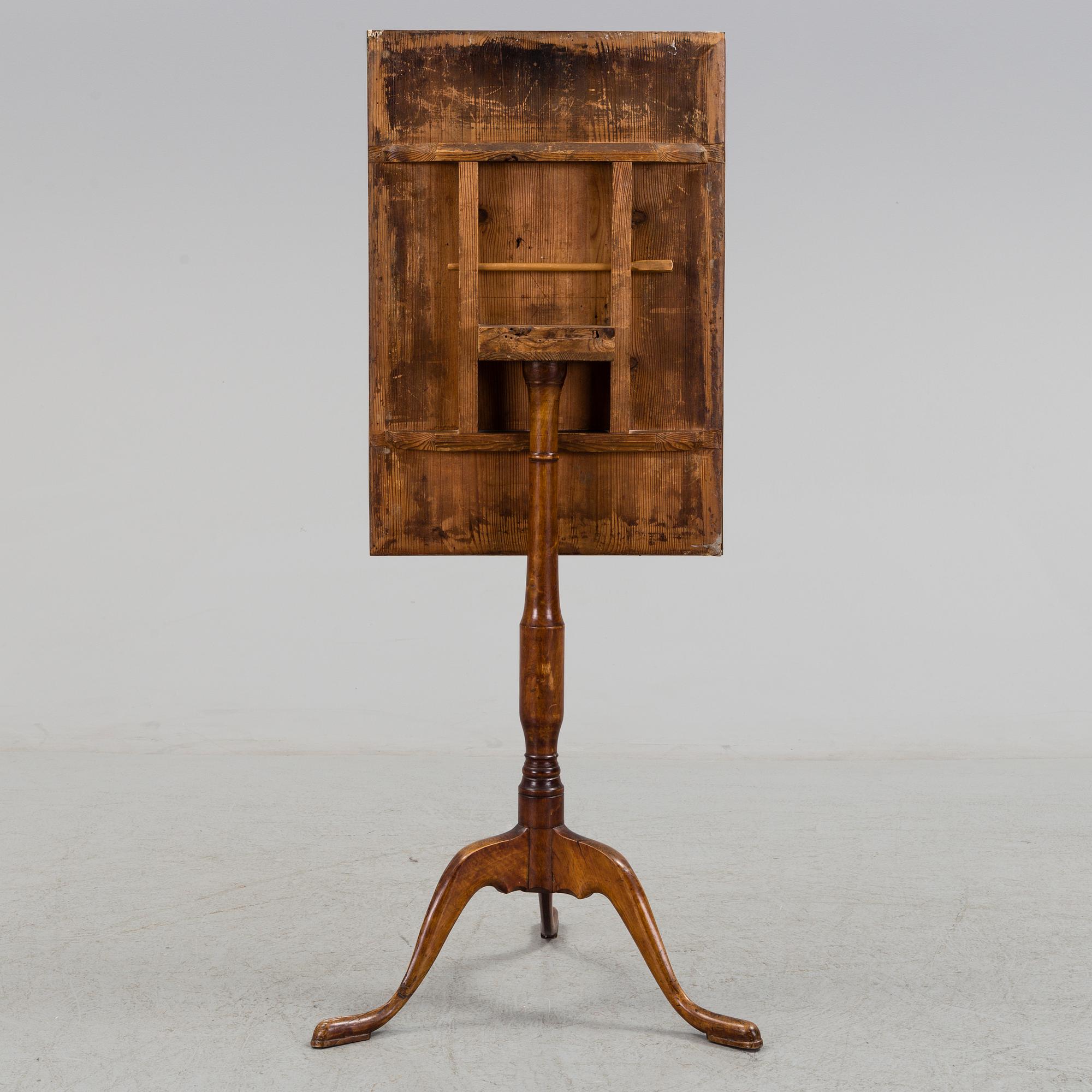 An early 19th century folding table.