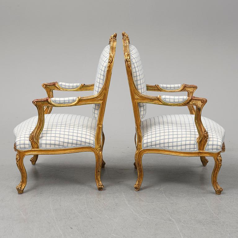 A pair of neo-rococo easy chairs, late 19th century.