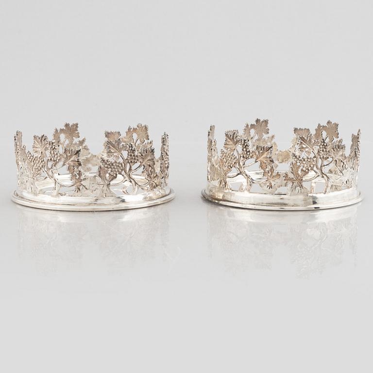 Coasters/flaskunderlägg, ett par, sterlingsilver, 1900-tal.