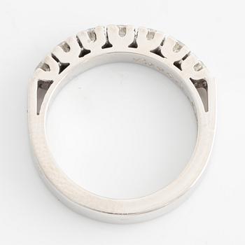 Half-eternity ring with brilliant-cut diamonds.
