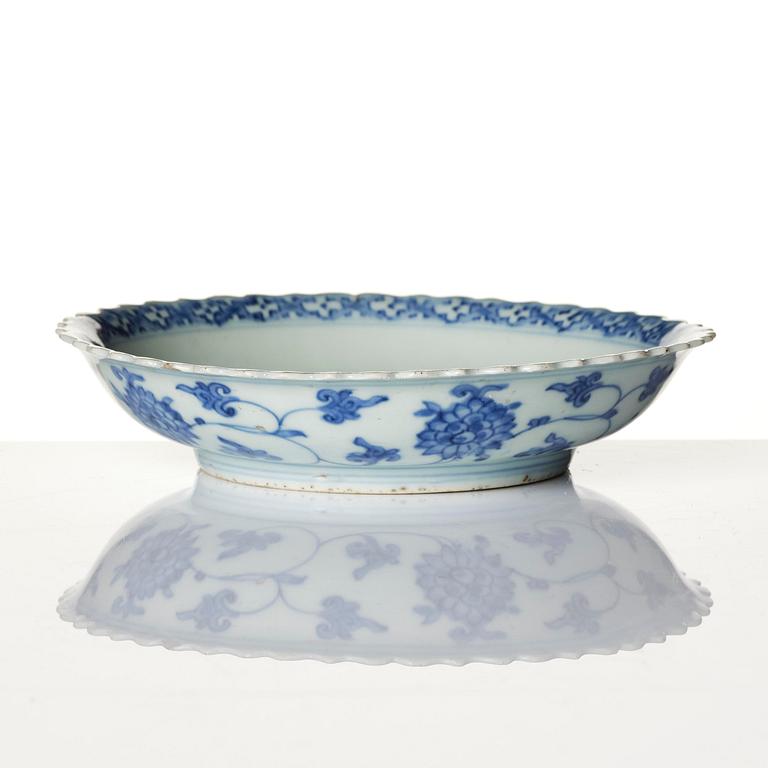 A blue and white dish, Ming dynasty, with a Jiajing mark.