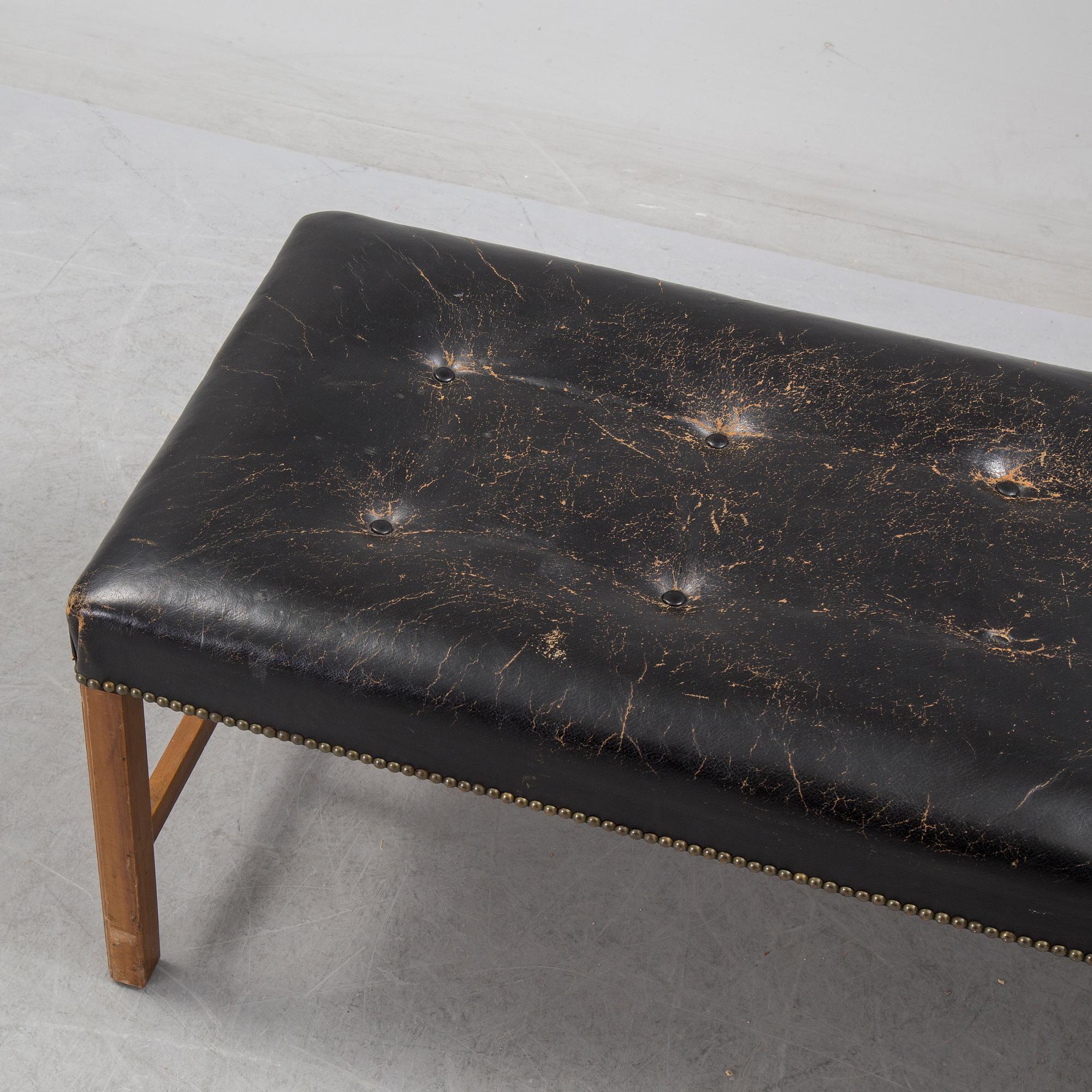 JOSEF FRANK, leather stool/bench, Firma Svenskt Tenn, model 2082.