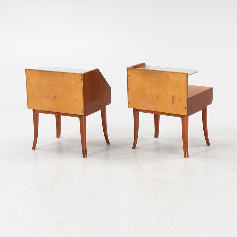A pair of Swedish Modern mahogany veneered bedside tables, 1940's.