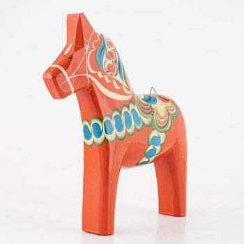 Dala horses, 4 pcs, and one wall-mounted, second half of the 20th century.