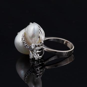 Baroque pearl and navette-cut and brilliant-cut diamond ring.