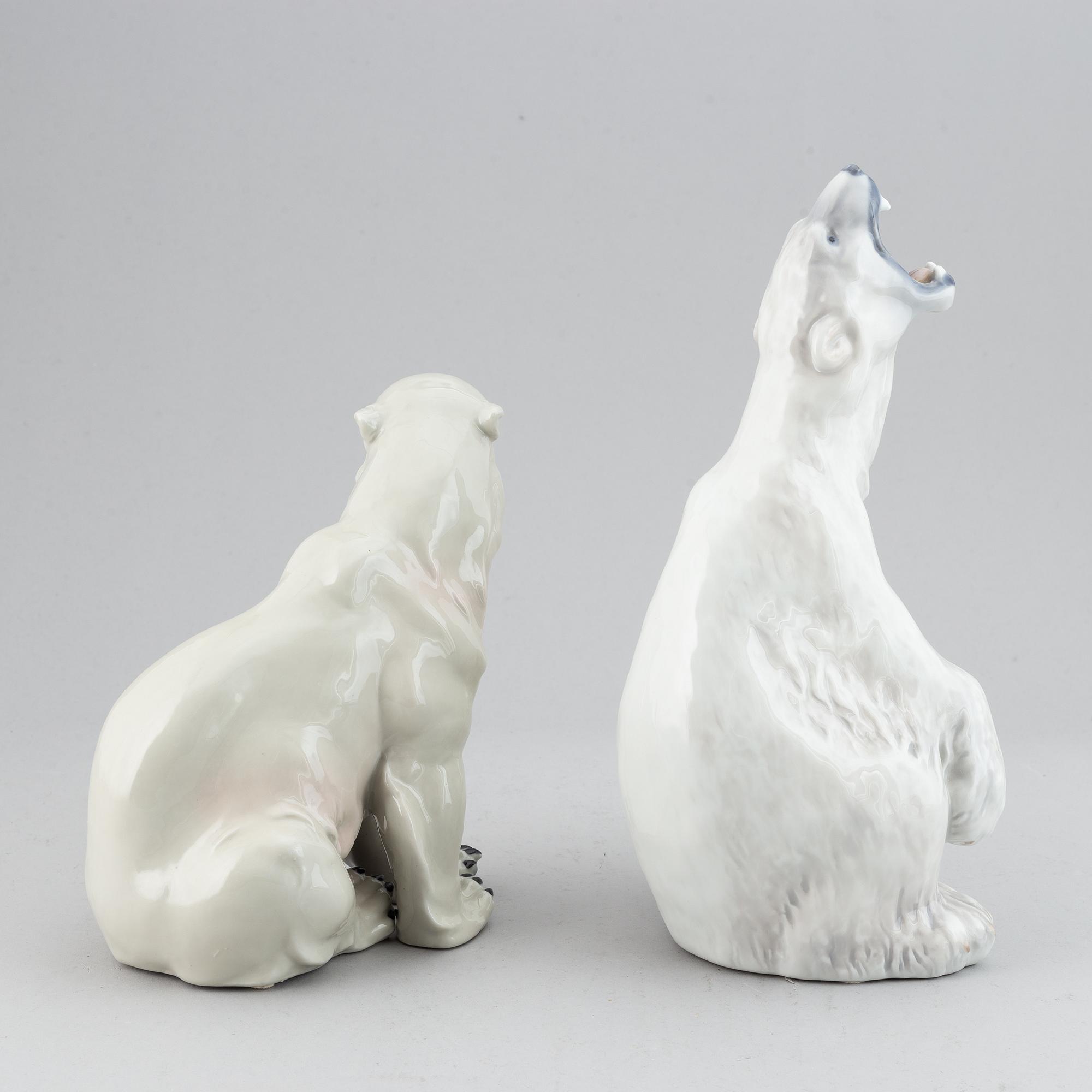 Two porcelain polar bear figurines, one marked Royal Copenhagen, 1966.