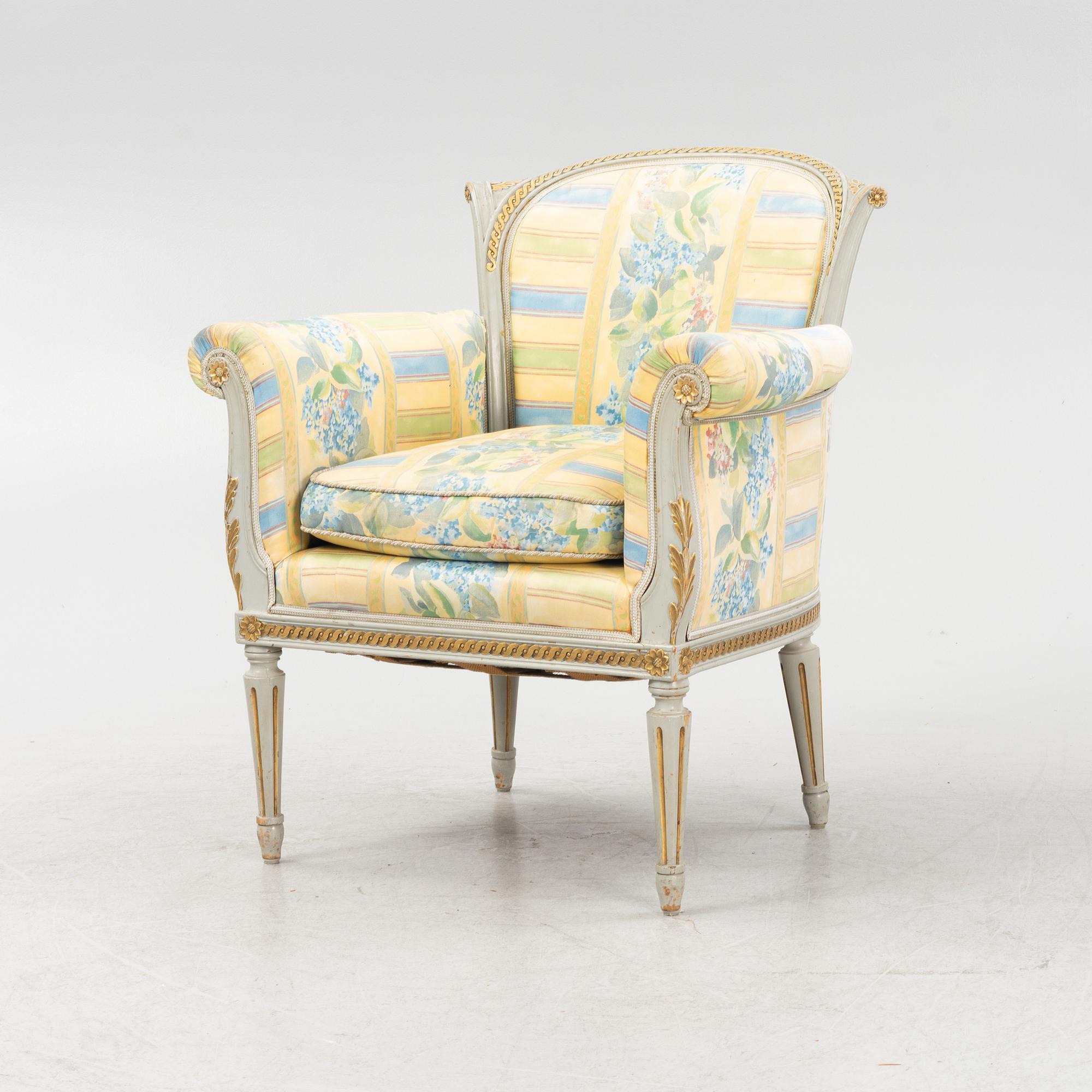 A Louis XVI style armchair, 20th Century.