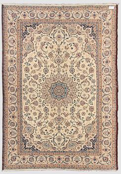 A carpet, Nain, part silk S.K 9LAA. Circa 352x248 cm.