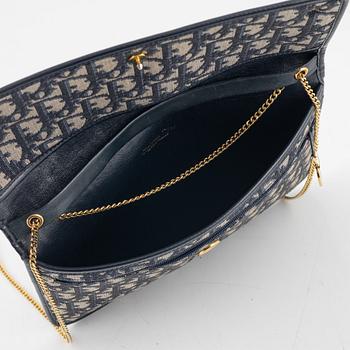 Christian Dior, bag and scarf.