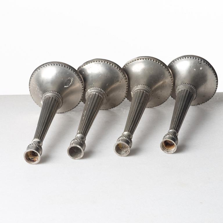 A set of four Swedish late Gustavian pewter candlesticks by E P Krietz, made in Stockholm.