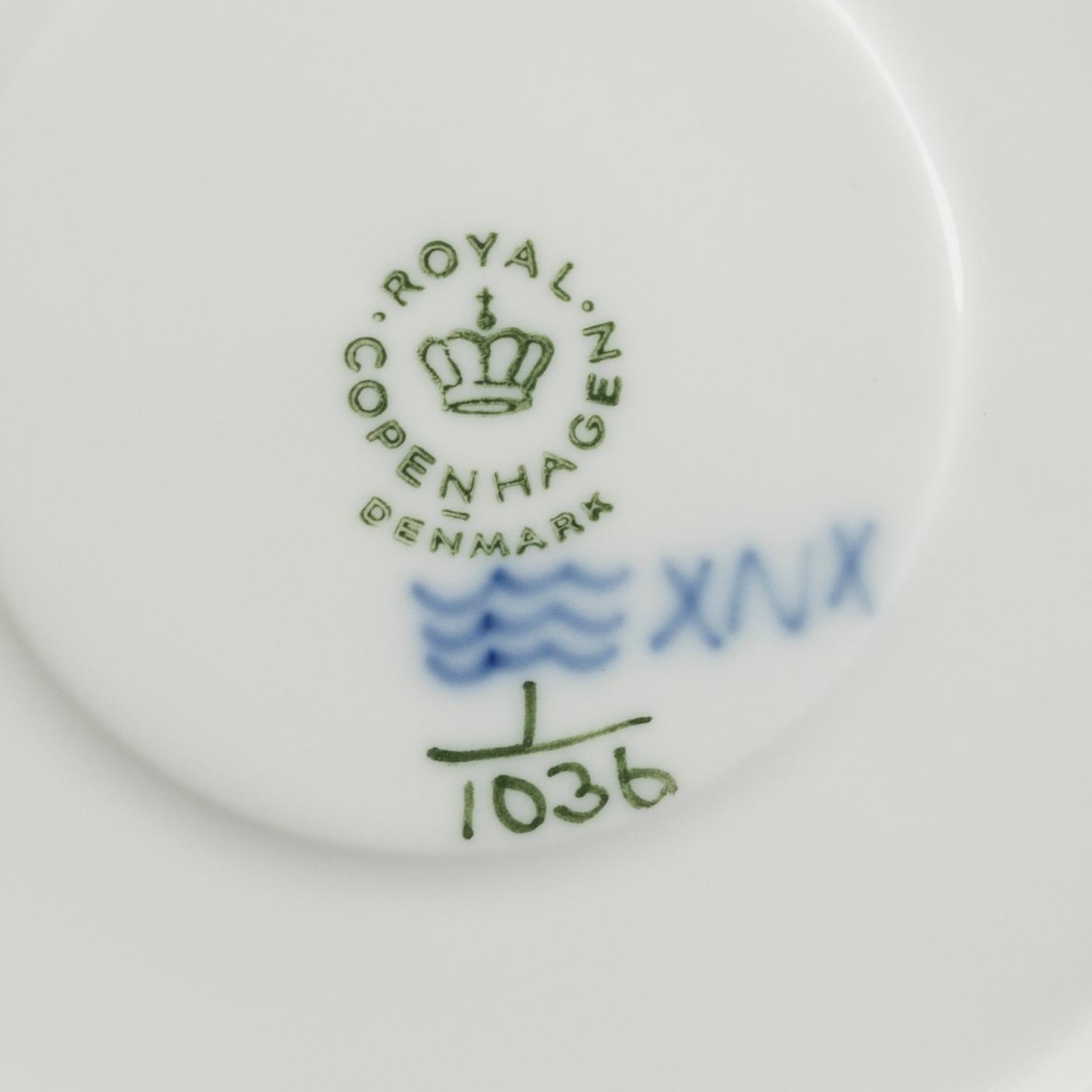 A set of 17 porcelain chocolat cups and saucers Musselmalet Royal Copenhagen Denmark.