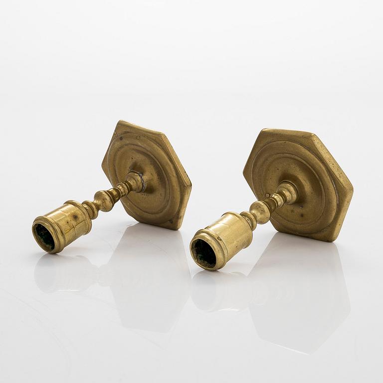 A pair of candle holders, so-called taper sticks, Flanders/Spain, late 17th century.