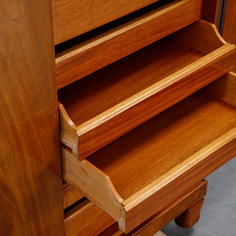 A 1940's Swedish Modern mahogany veneered cabinet.
