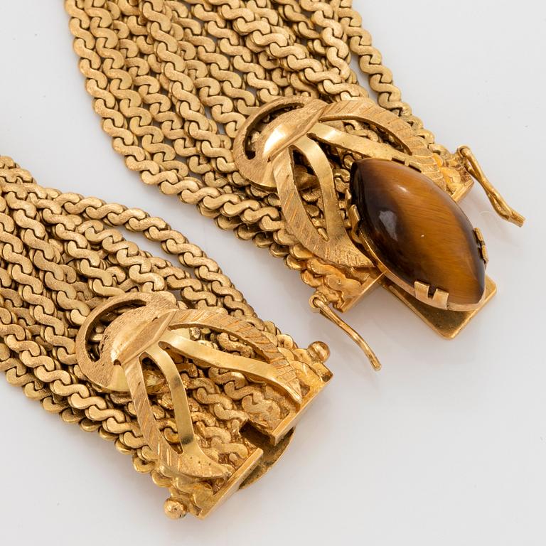 Armband 18K guld med kvarts-kattöga.