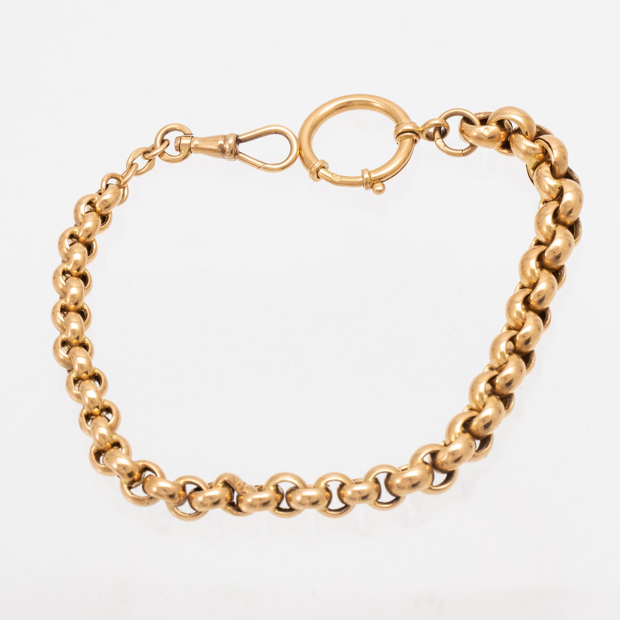 An 18K pocket watch chain.
