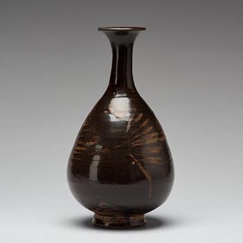 A brown and black glazed vase, Song dynasty (960-1279).