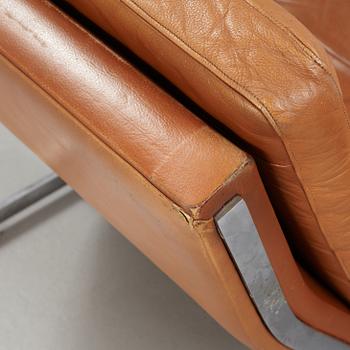 A pair of Poul Nørreklit chromed steel and brown leather easy chairs, Selectform, Denmark 1960's.