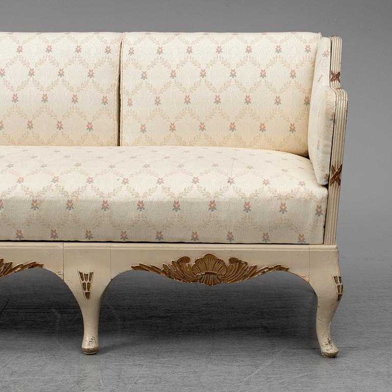 An early 20th century rococo revival sofa.