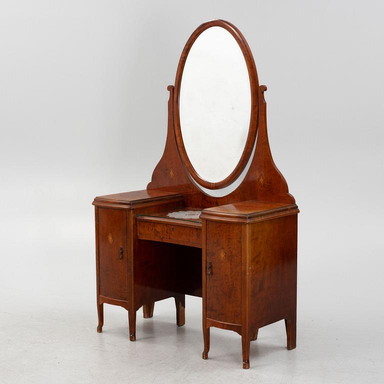 A birch veneered dressing table with two chairs.