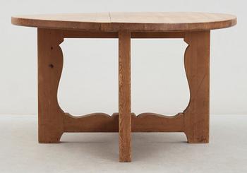 A stained pine dining table, attributed to Axel Einar Hjorth, Nordiska Kompaniet, 1930's.