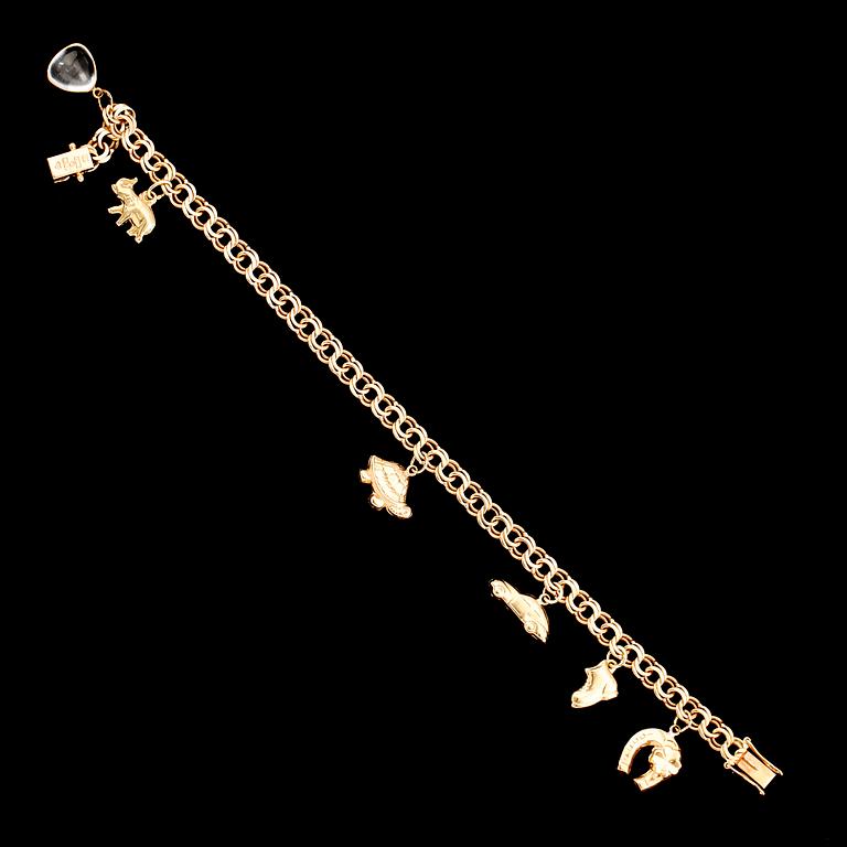 BERLOCKARMBAND, 18 k guld, 1959, bismarcklänk. Vikt ca 13 gram.
