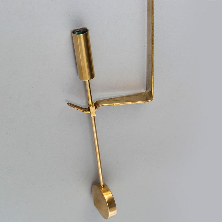 A pair of 'Pendel' wall scones by Pierre Forsell for Skultuna.