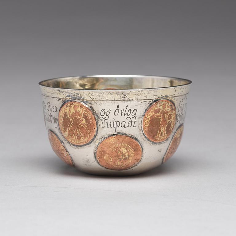 A Swedish 18th century parcel-gilt tumbler with copper coins, mark of Mikael Hammberg, Harnosand (-1758-1789(1790)).