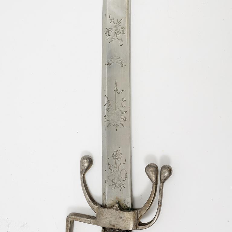 A Spanish sabre with a Nimcha-type hilt with scabbard, 19th Century.