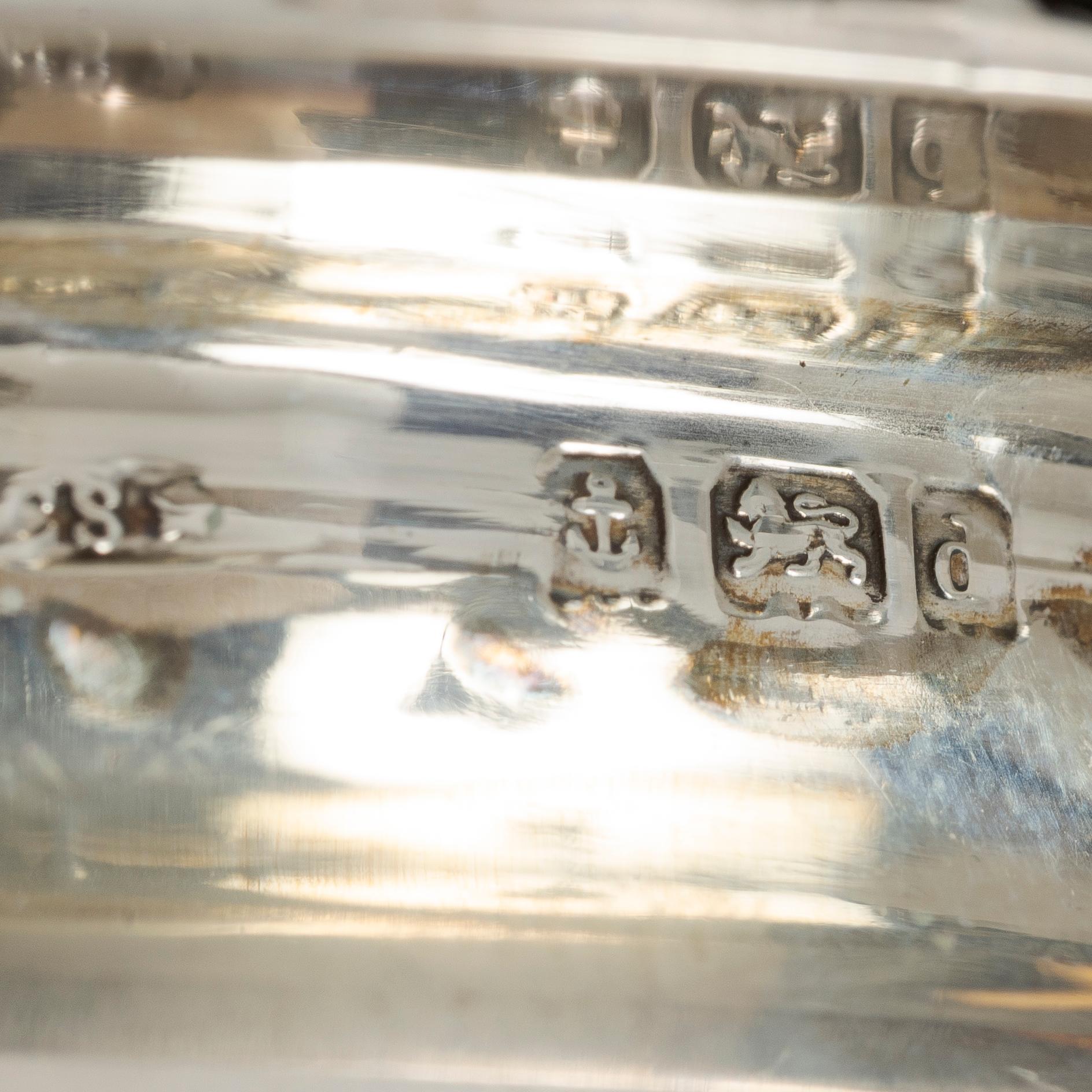 Coasters, a pair, silver, Birmingham, England, and shakers, a pair, silver, Norway.