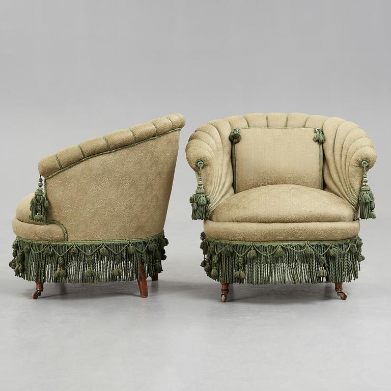 A pair of easy chairs, circa 1900.