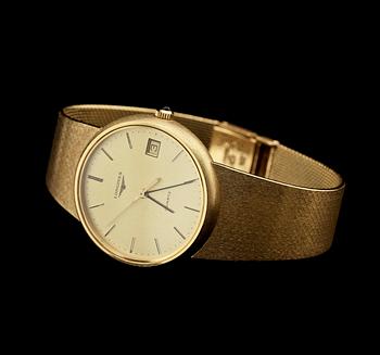 HERRARMBANDSUR, Longines, 18k guld med blå safirknopp, 1900-tal. Vikt 84 g.