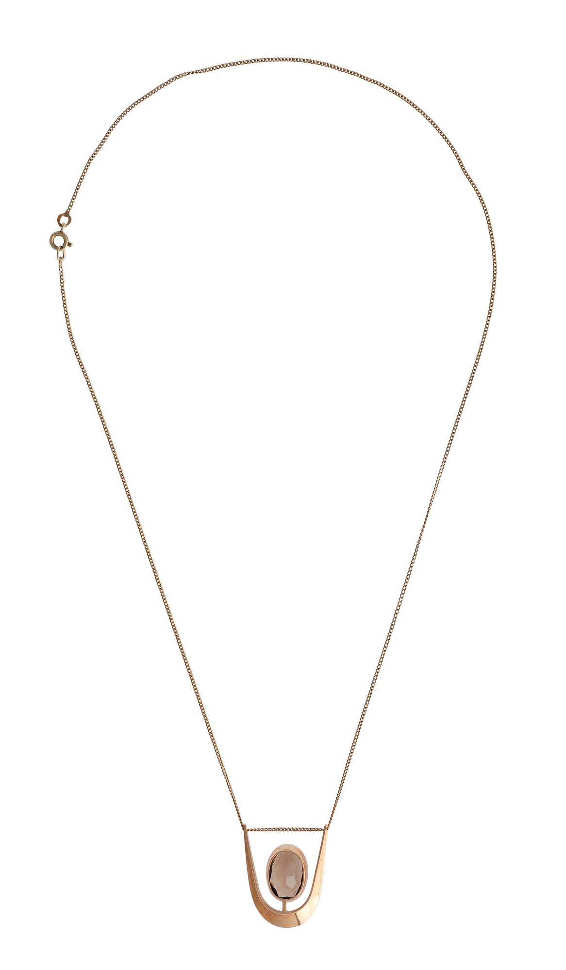 Eero Rislakki, A PENDANT, 14K gold, smoke quartz, N. Westerback 1962. Signed ER.