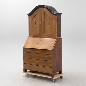 A mahogany-veneered Empire cabinet, first part of the 19th Century.