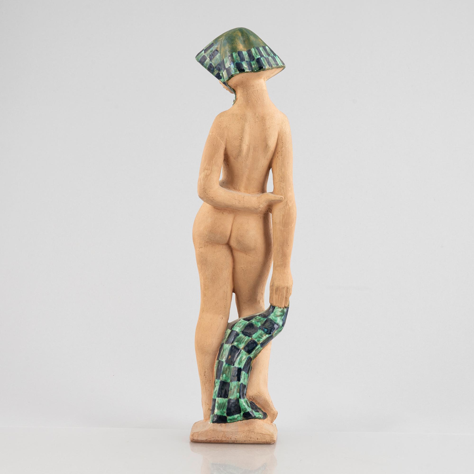 Helge Christoffersen, an earthenware figure of a woman, 1950's.