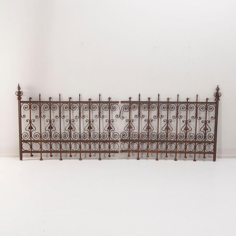 A cast iron fence around 1900.