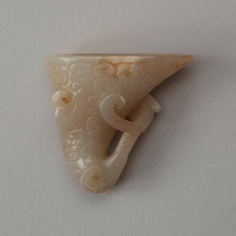 A carved white nephrite libation cup, China.