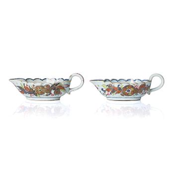 A pair of famille rose pseudo tobacco leaf sauce boats, Qing dynasty, Qianlong (1736-95).