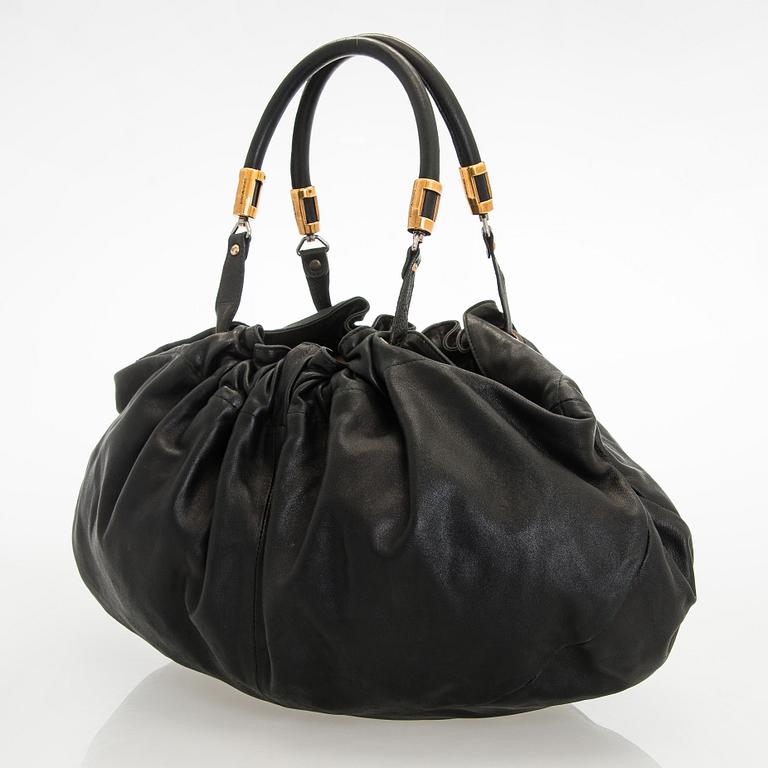 Emporio Armani, a leather bag.