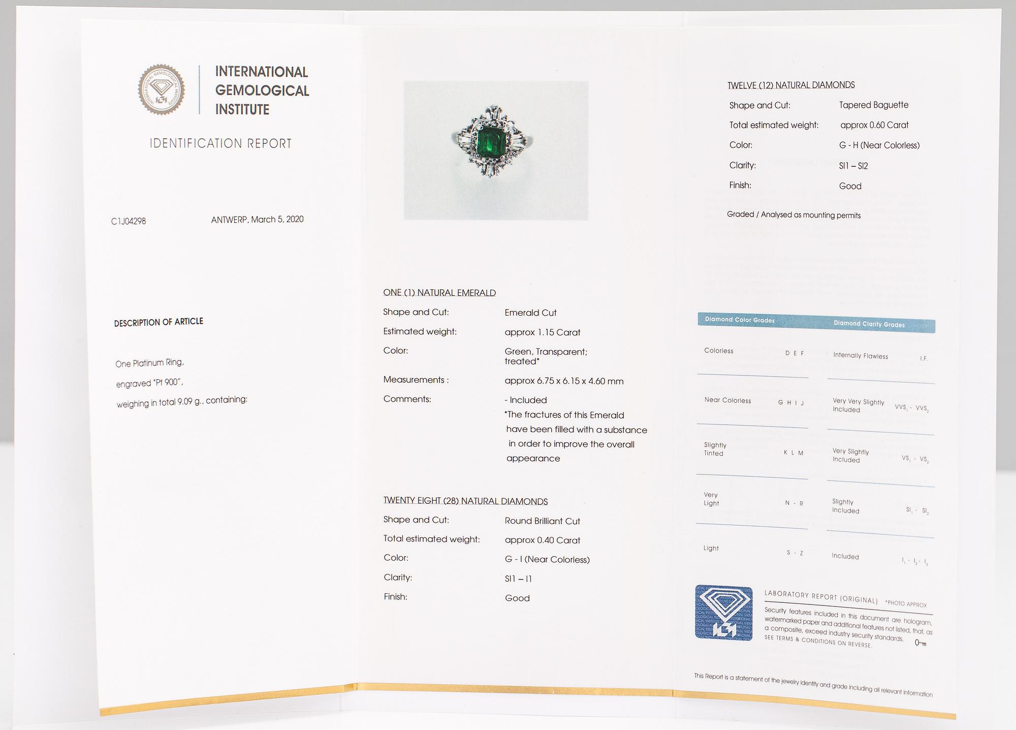 A platinum ring with a ca. 1.15 ct emerald and ca. 1.00 cts of diamonds in total.
