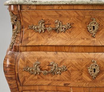 A Swedish early Rococo 18th century commode by Christian Linning (master in Stockholm 1744-1779).