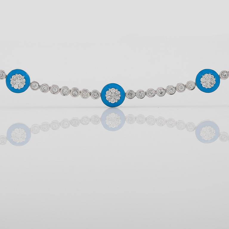 ARMBAND, 18K vitguld, emalj och diamanter tot ca 1.60 ct.