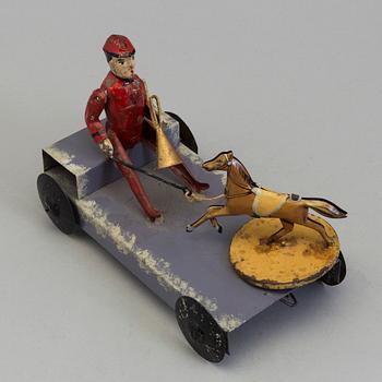 a tin toy, probably Germany in the early 20th century.