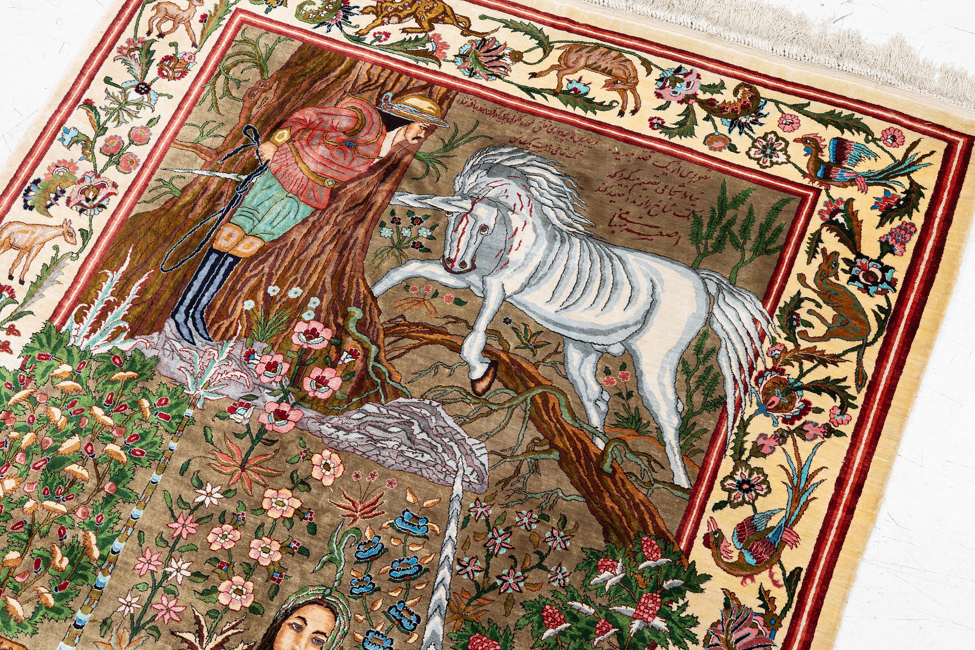 A silk Qum rug, central Persia, c. 213 x 135 cm.