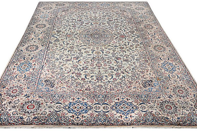 A Nain carpet, part islk, 9 laa, c. 453 x 298 cm.