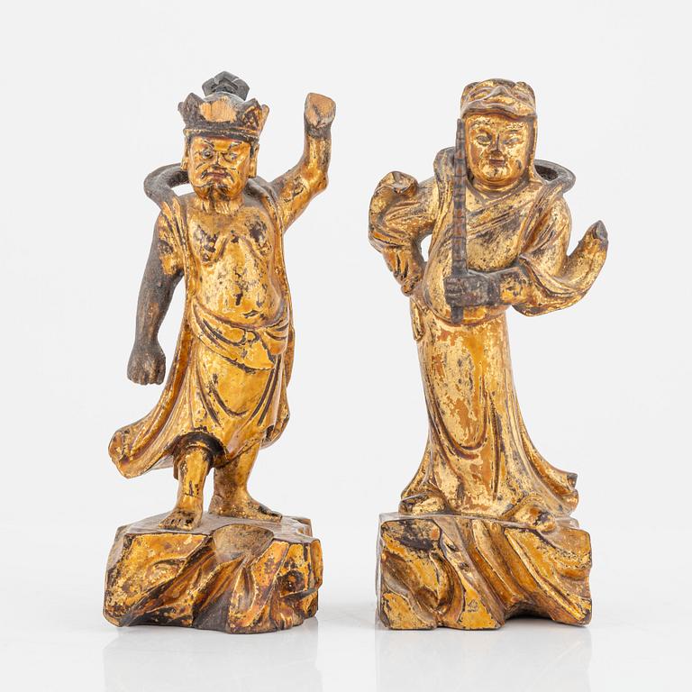 Two wooden figures of guardsmen, Qing dynasty, 19th Century.