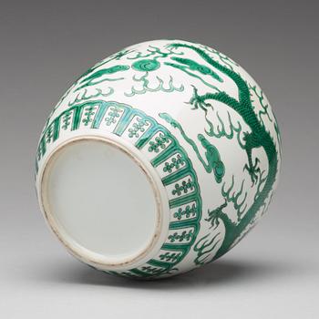 A green enamelled dragon jar, China, circa 1900.