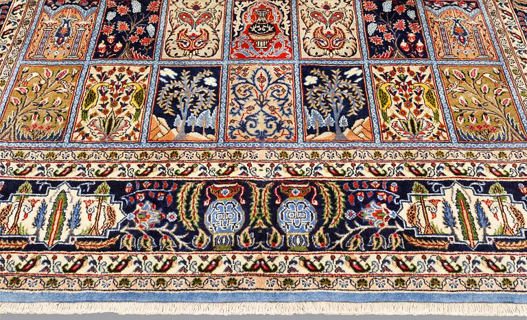 A Figural Sarouk carpet, c. 348 x 240 cm.